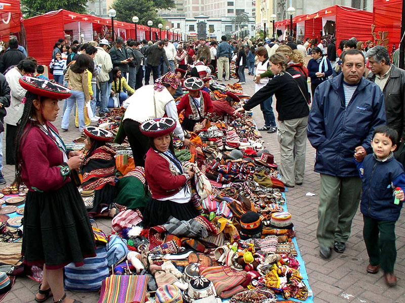 Customers at a street market in Lima Peru.