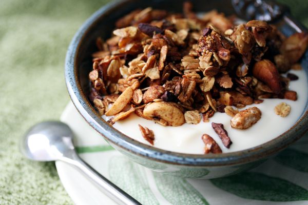 Maple granola in a bowl with milk.