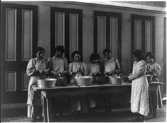 Native American girls at a cooking class 