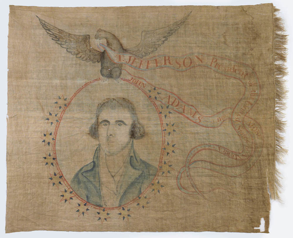 Portrait of Thomas Jefferson on a victory banner.
