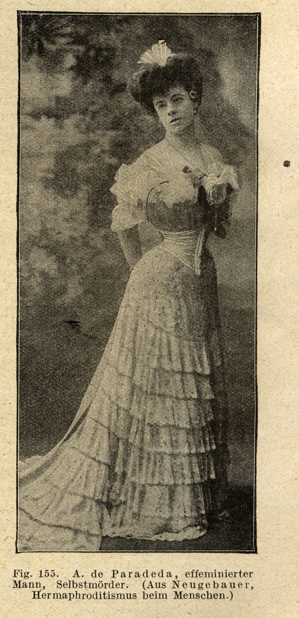 Old photograph of a woman in a dress.