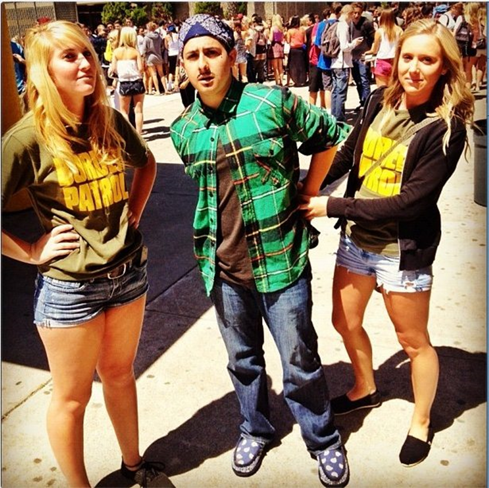 Students wearing Border Patrol T-shirts and stereotypical gang-member costumes