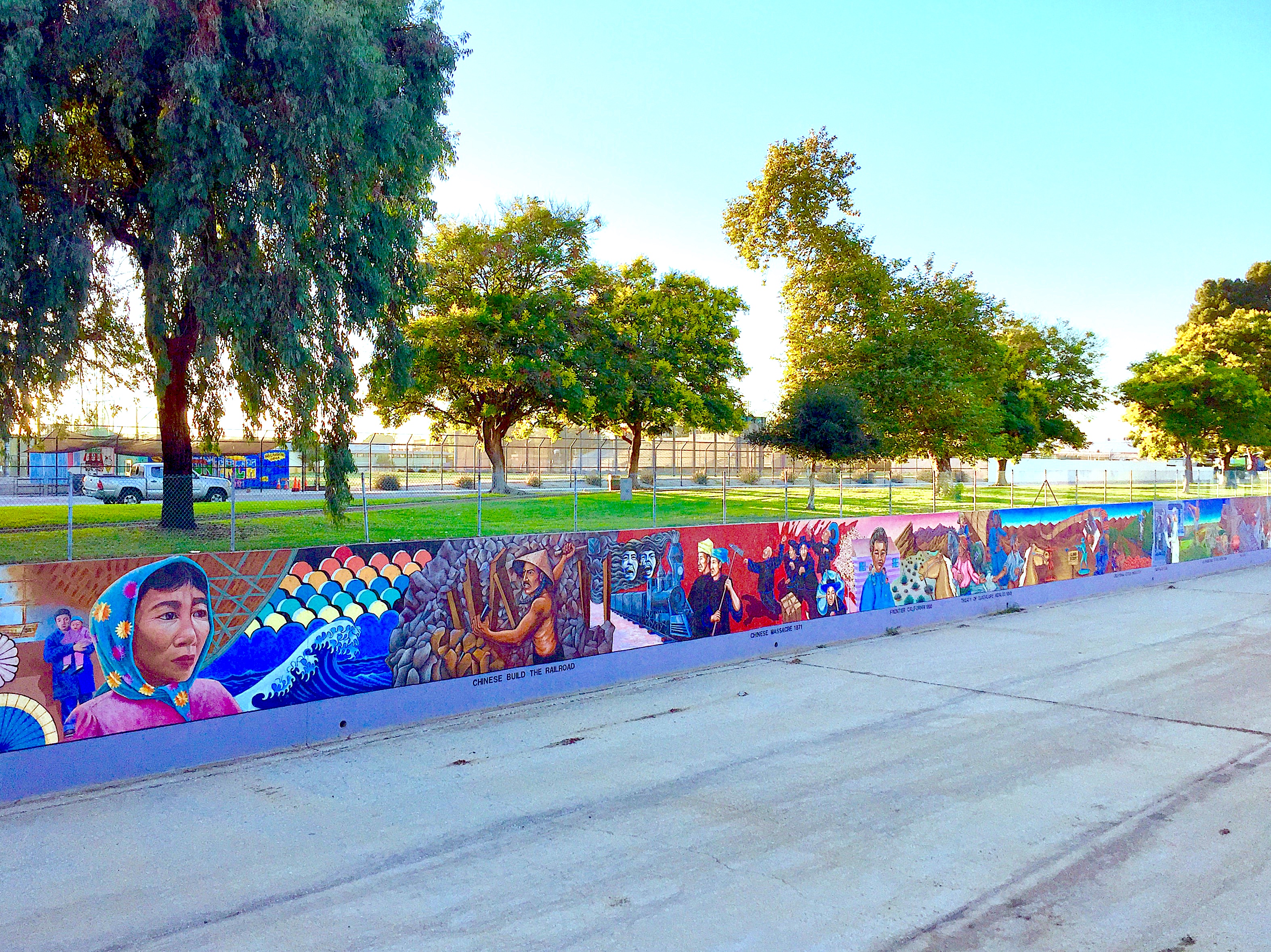 Piece of a colorful mural by Chicana artist Judy Baca