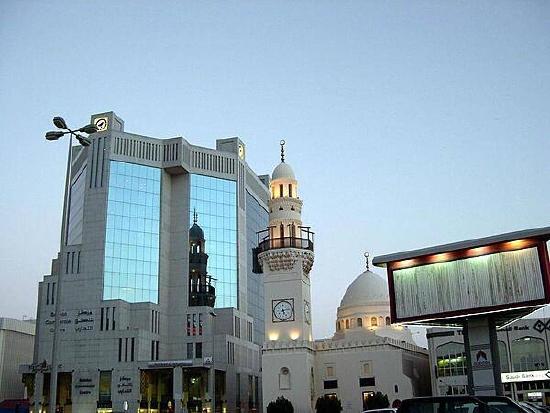 Highrise buildings and a mosque in downtown Manama, capital of Bahrain