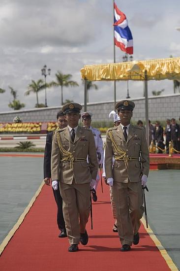 Burmese Air Force officers escort a Thai delegation