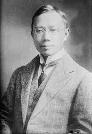 Dr. Wu Lien-teh in a suit posing for a black and white photograph