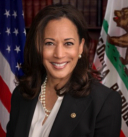 A headshot of Vice President Kamala Harris looking directly at the camera and smiling. She is in front of the American flag on the left and the flag of the State of California on the right.