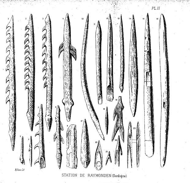 Long, thin spear tips. Many have barbs, others are smooth.
