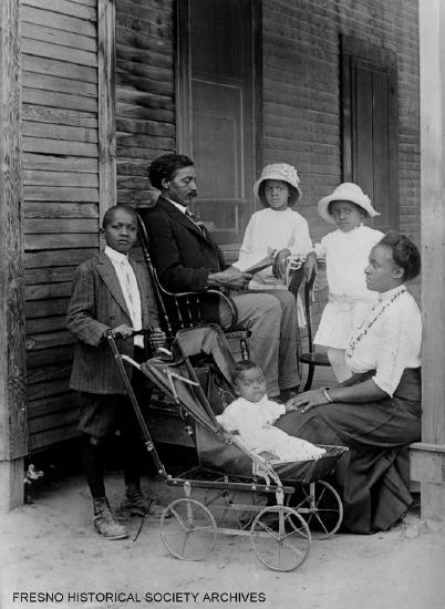 African American family on their porch in Fowler CA circa 1915.jpg