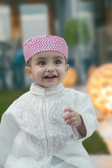 infant in cultural clothing