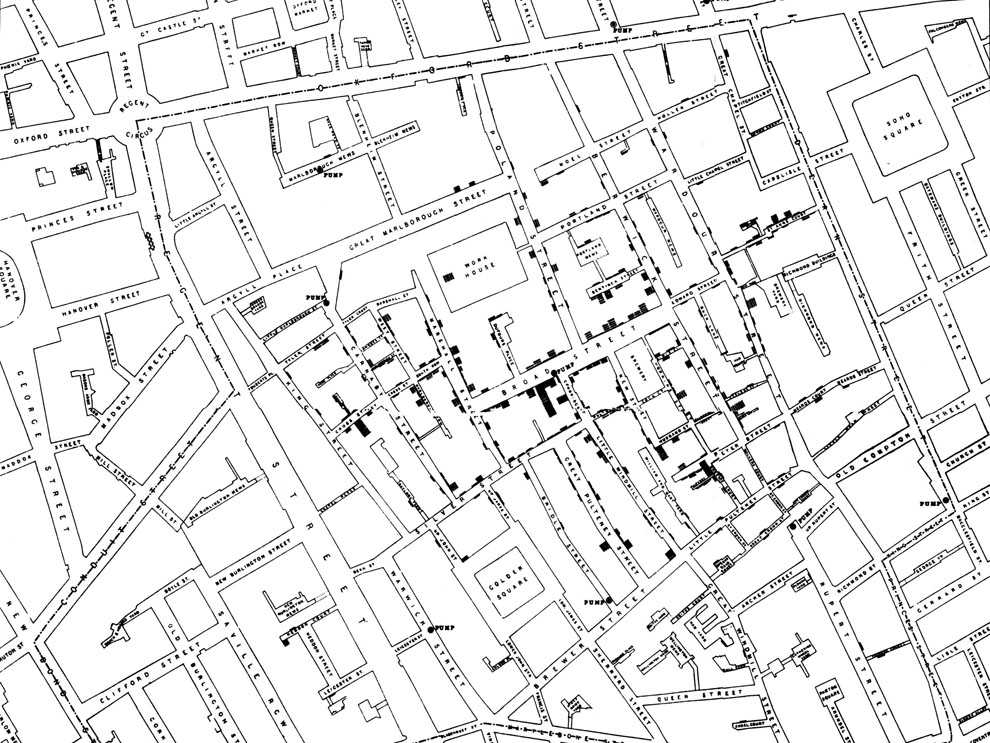 A detailed black and white street map showing a dense network of roads and intersections, with numerous buildings and blocks labeled with text.