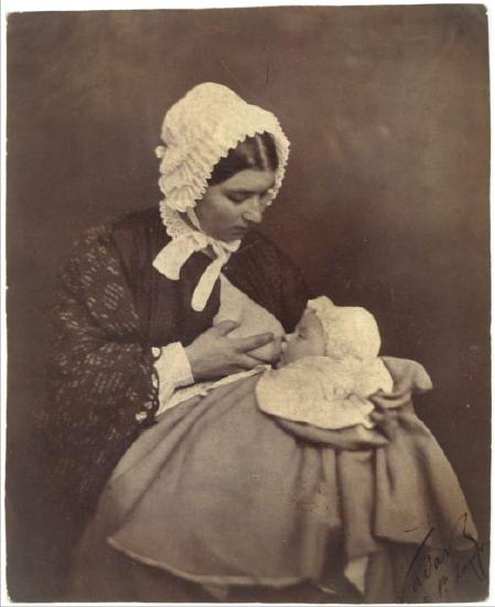 Infant at the breast of a wet nurse. Portrait by Paul Nadar.