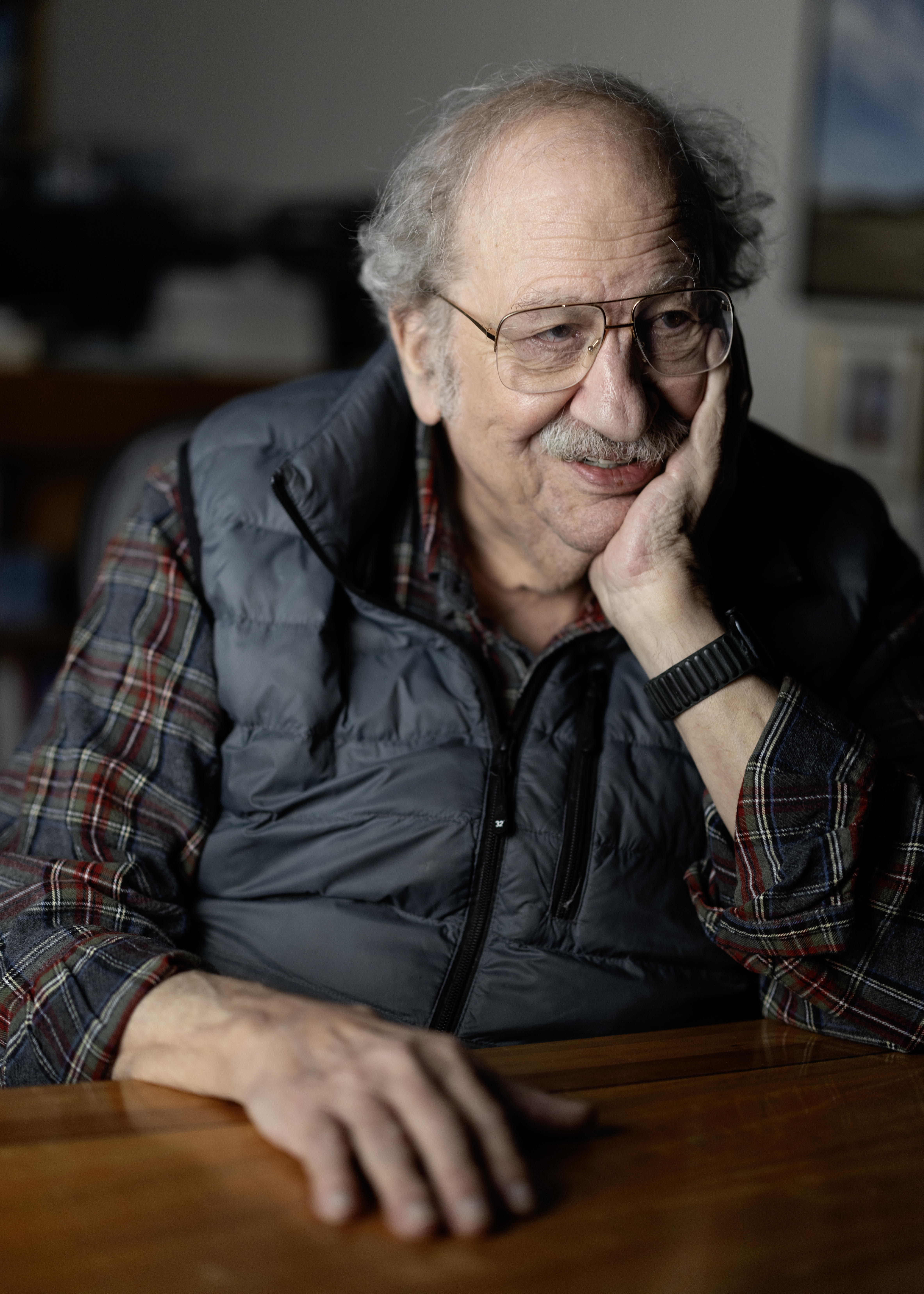 Marshall Ganz in 2024 sitting plaving his elbow on the table