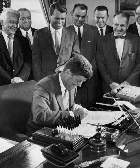 John F. Kennedy signing an Executive Order for Affirmative Action