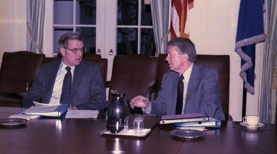 President Jimmy Carter consults with Vice President Walter Mondale in the White House. 