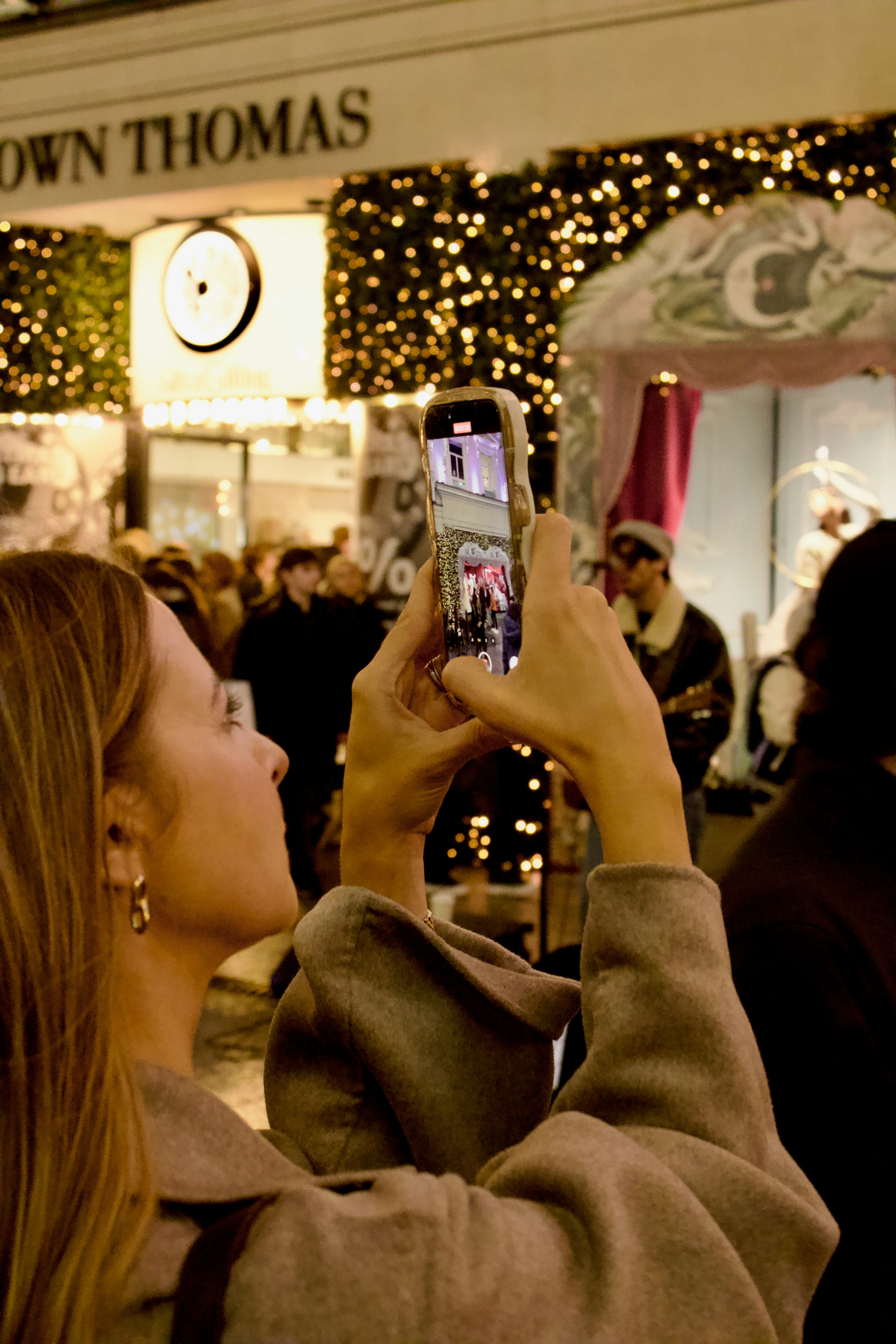 Girl looks at social media on cell phone