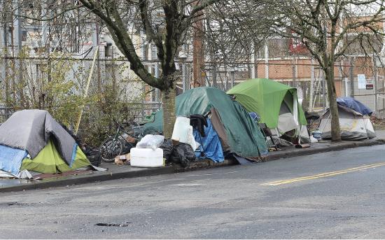  Homeless encampment along city street in Portland, Oregon.