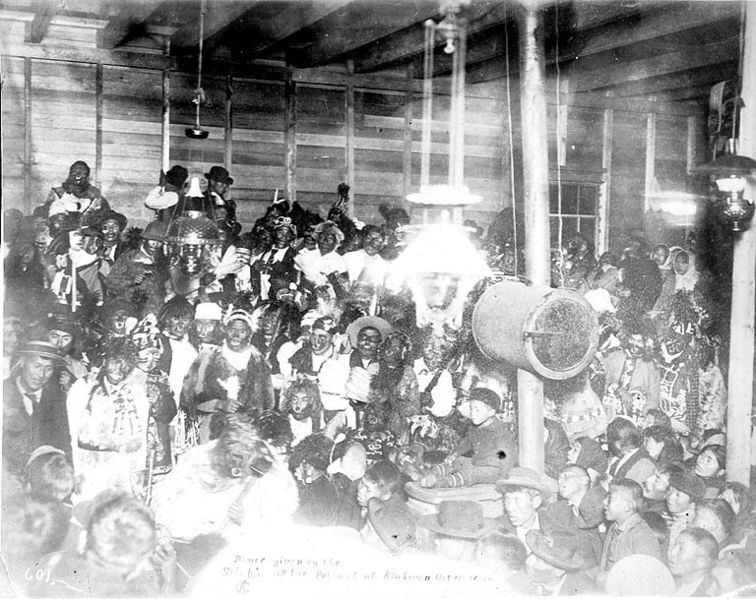Dancers_in_ceremonial_dress_at_a_Tlingit_potlatch,_Klukwan,_Alaska,_October_15,_1898_(HEGG_521).jpeg.jpg