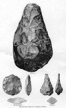 Acheulean hand axes of various shapes which appear as stones chipped to various axe head shapes with sharpened edges.