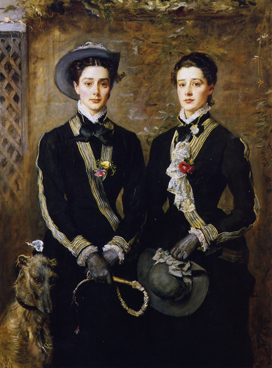 Un portrait de jumeaux portant un équipement de chasse traditionnel est présenté.