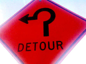 Detour sign for a roundabout intersection