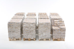 Dollars piled up on crates, totaling one billion.