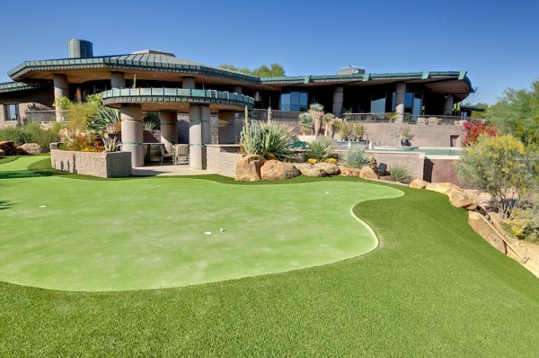 A luxurious house with a personal golf range