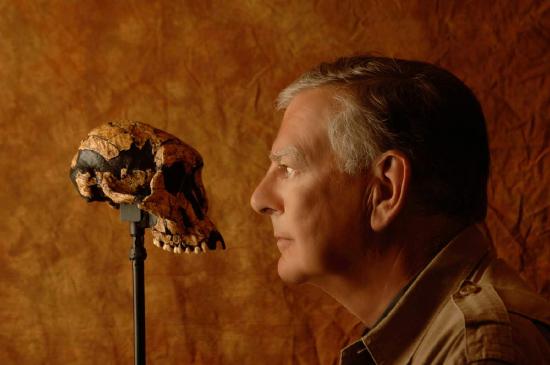 Image of Donald Johanson and an Australopithicus fossil skull.