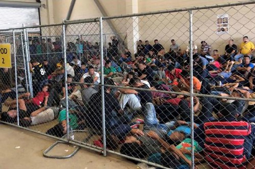 Families being held in a migrant detention facility.