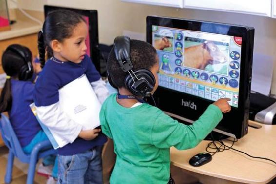 C:\Users\paris_j\Pictures\OER Images\children at computer from ppg.JPG