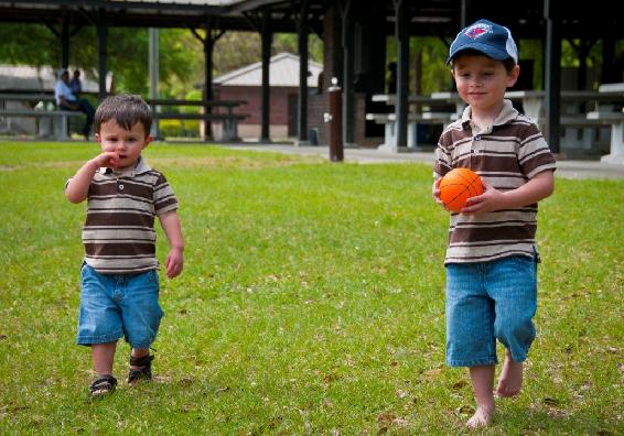 boy with autism spectrum disorder holding ball
