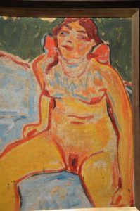 Painting of a seated nude girl.