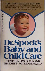 A photo of the front cover of one of Dr. Spocks book entitled Dr. Spock's Baby and Child Care