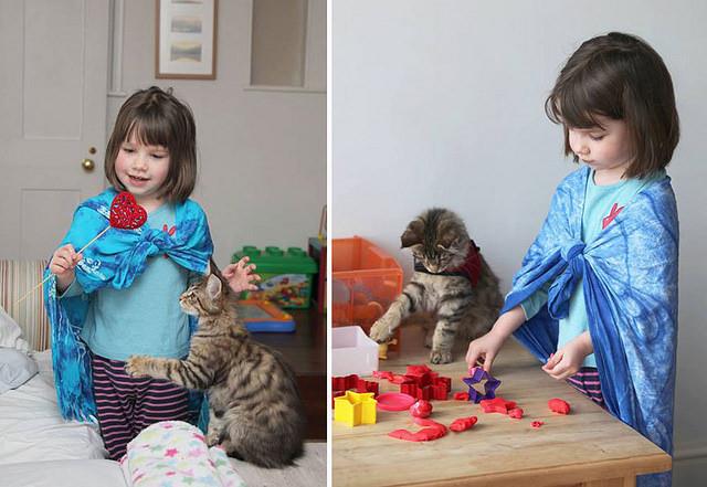 a young girl plays with Play Dough and her pet cat