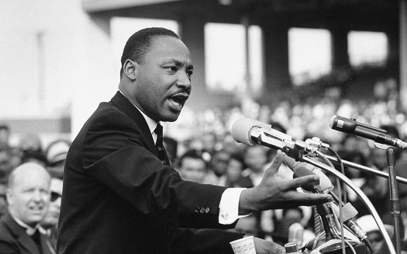 Martin Luther King, Jr. speaking at a large event