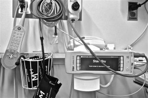 Photograph showing hospital room equipment.