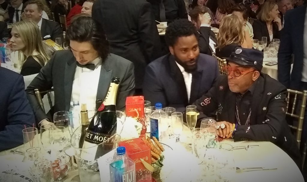 Photo of table of actors at an awards ceremony.