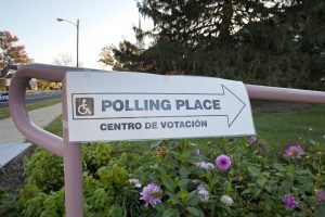 Photograph of a sign showing where a polling place is located.
