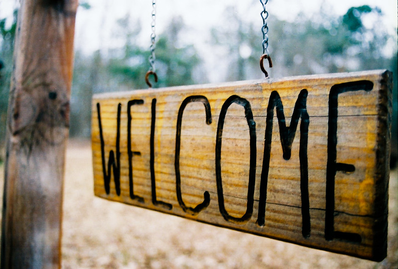 wooden "Welcome" sign