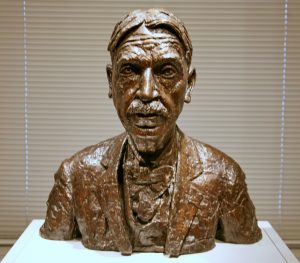 Bronze-bust-of-John-Dewey-1927-by-Jacob-Epstein.-Photo-by-Cliff-Flikr-300x263.jpg