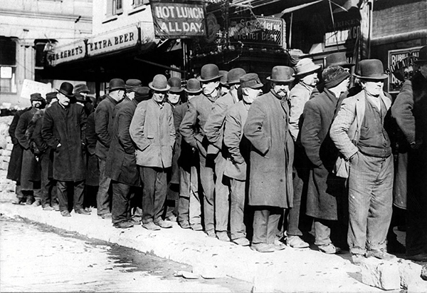 Bowery men waiting for bread in bread line, New York City, Bain Collection from the Library of Congress