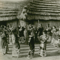 A gathering of people in a ceremony.