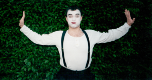 Pictured is a Mime actor.