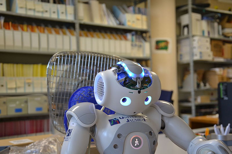 A modern robot is shown in a lab