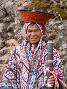 A man from the Andes Mountains is dressed in traditional attire.