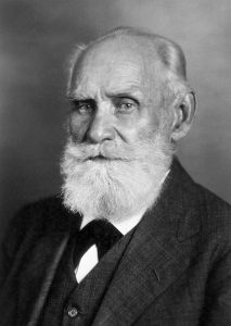 Black and white image of Ivan Pavlov - elderly man with white beard dressed in suit