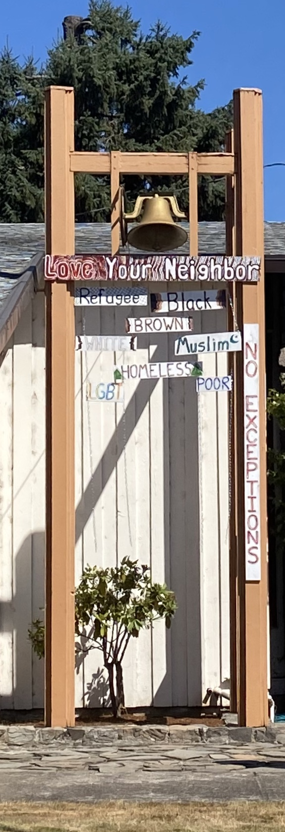 Welcoming sign on a community church near rural Oakridge, Oregon.