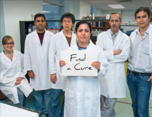 Group-of-Doctors-w.-Find-A-Cure-sign-300x232.jpeg