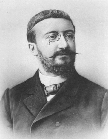 Photo of Alfred Binet with glasses and beard