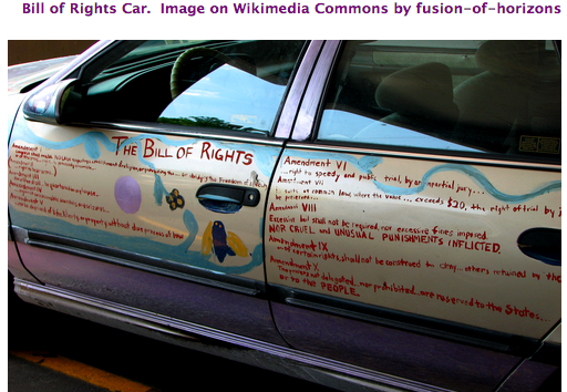 Photograph of a car with the text of the Bill of Rights written on its side panels.